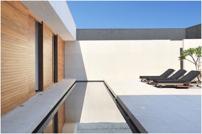 Интериорен дизайн на частен дом от Guilherme Torres