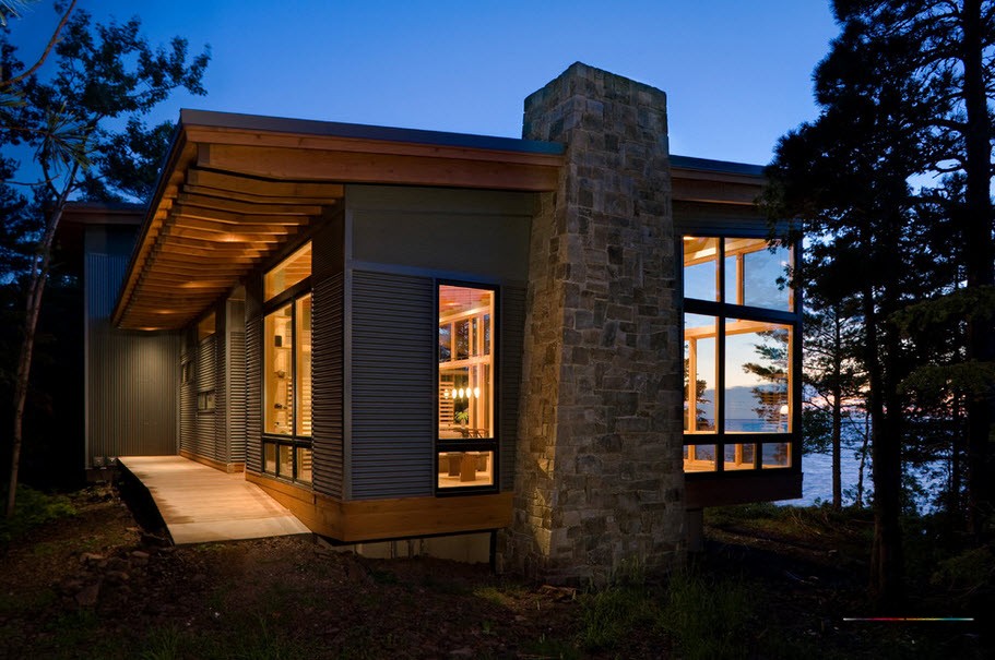 Стилният дизайн на селски къщи и вили в модерен стил в снимката